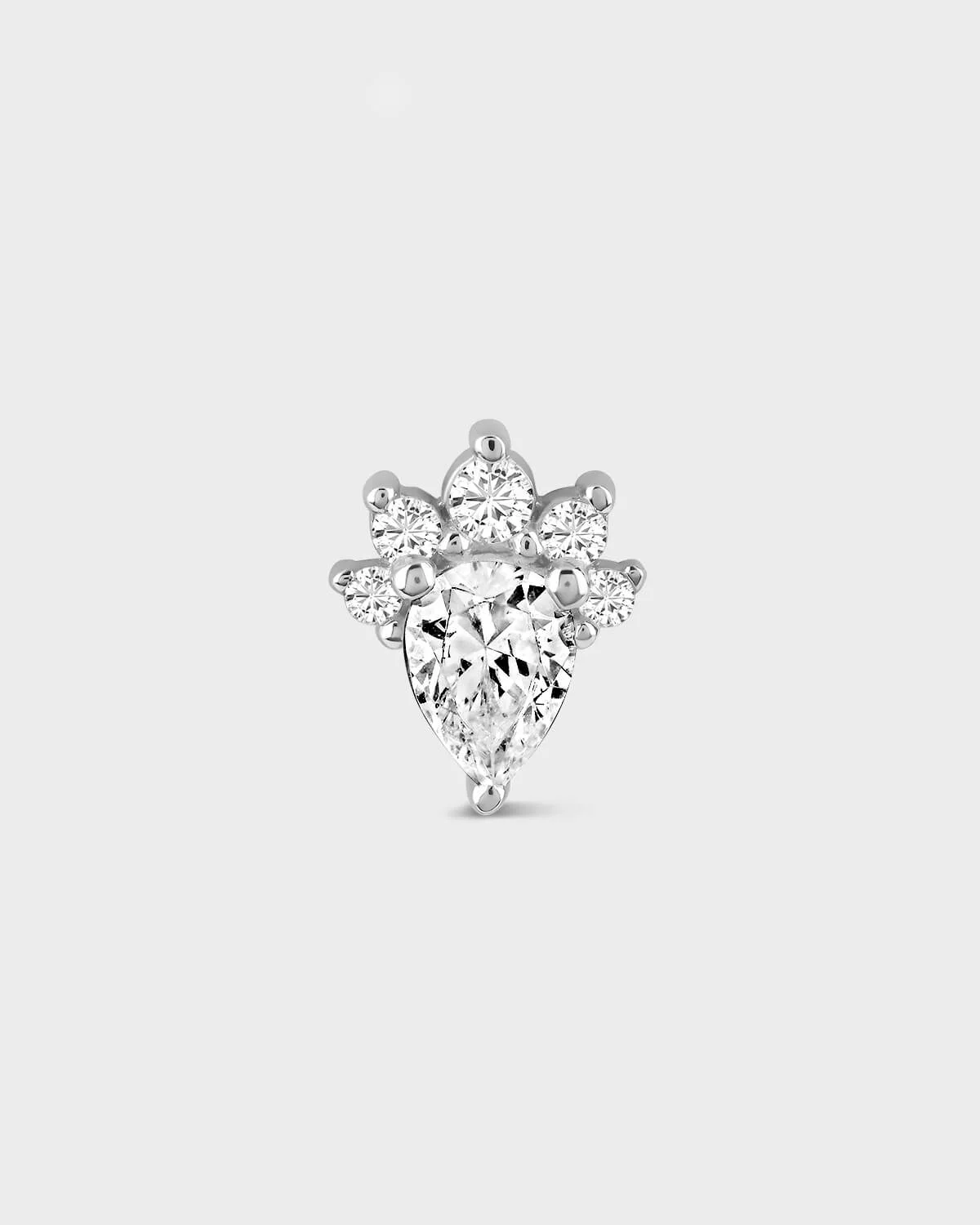 Diamond earring on a light gray background