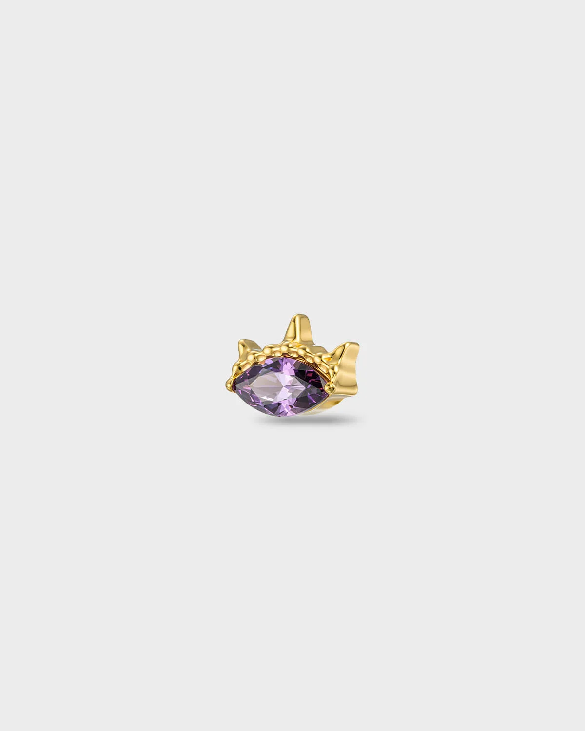 Gold titanium earring with an oval-cut amethyst purple stone set into a sculpted, recessed frame, on a light gray background.