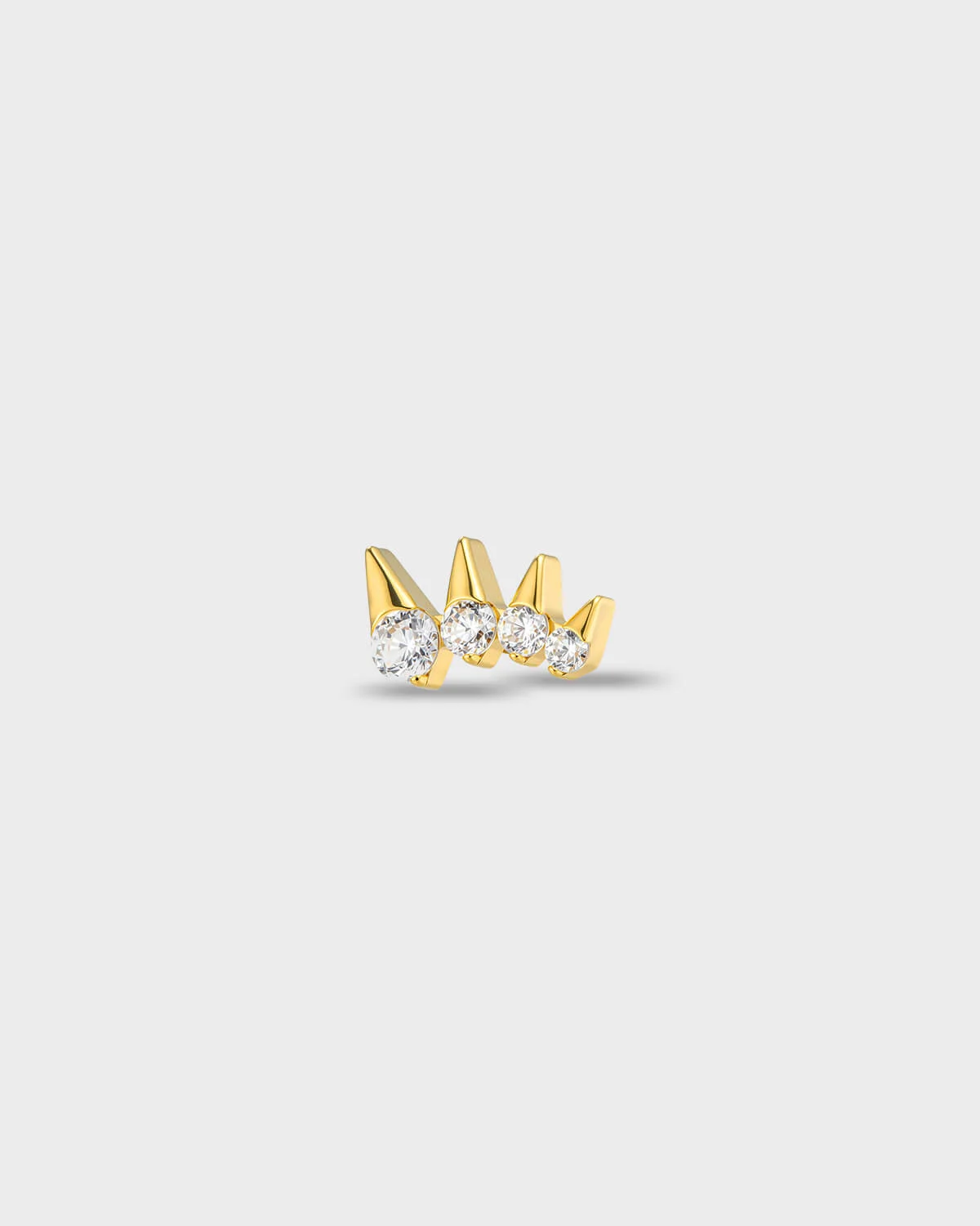Gold titanium earring with four round-cut clear stones set in a stepped, tapered arrangement and matching cones above, on a light gray background.