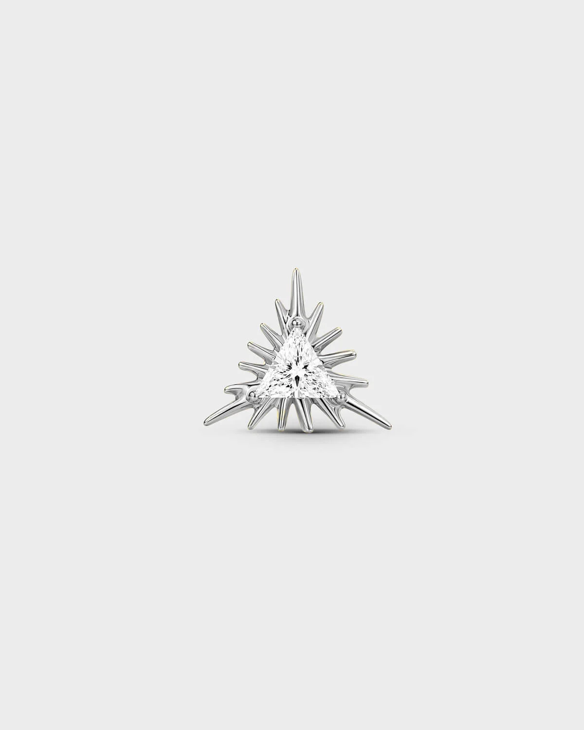 Polished silver titanium threadless end earring with a trillion-cut clear stone set within a sculpted sunburst design