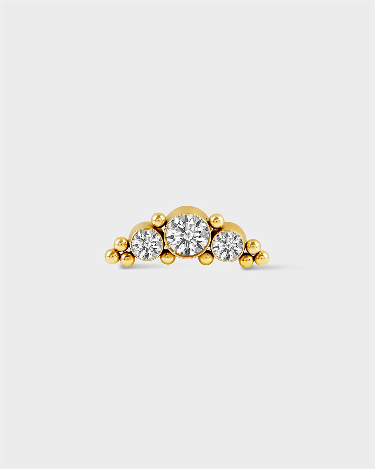 Earring with 3 gems in a crescent shape with small bead detailing in 24k Gold PVD on a light grey background