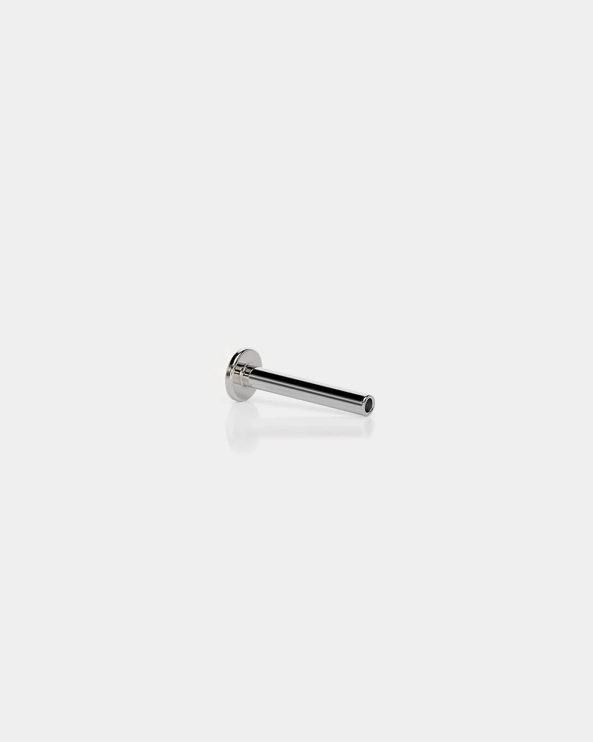 Threadless titanium labret back in polished silver with a 3mm base and 16g shaft on a light gray background