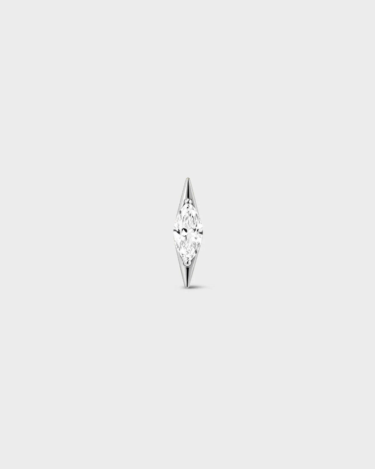 Polished silver titanium threadless end with a marquise-cut clear stone set in a tapered, sculpted setting. On a light grey background.