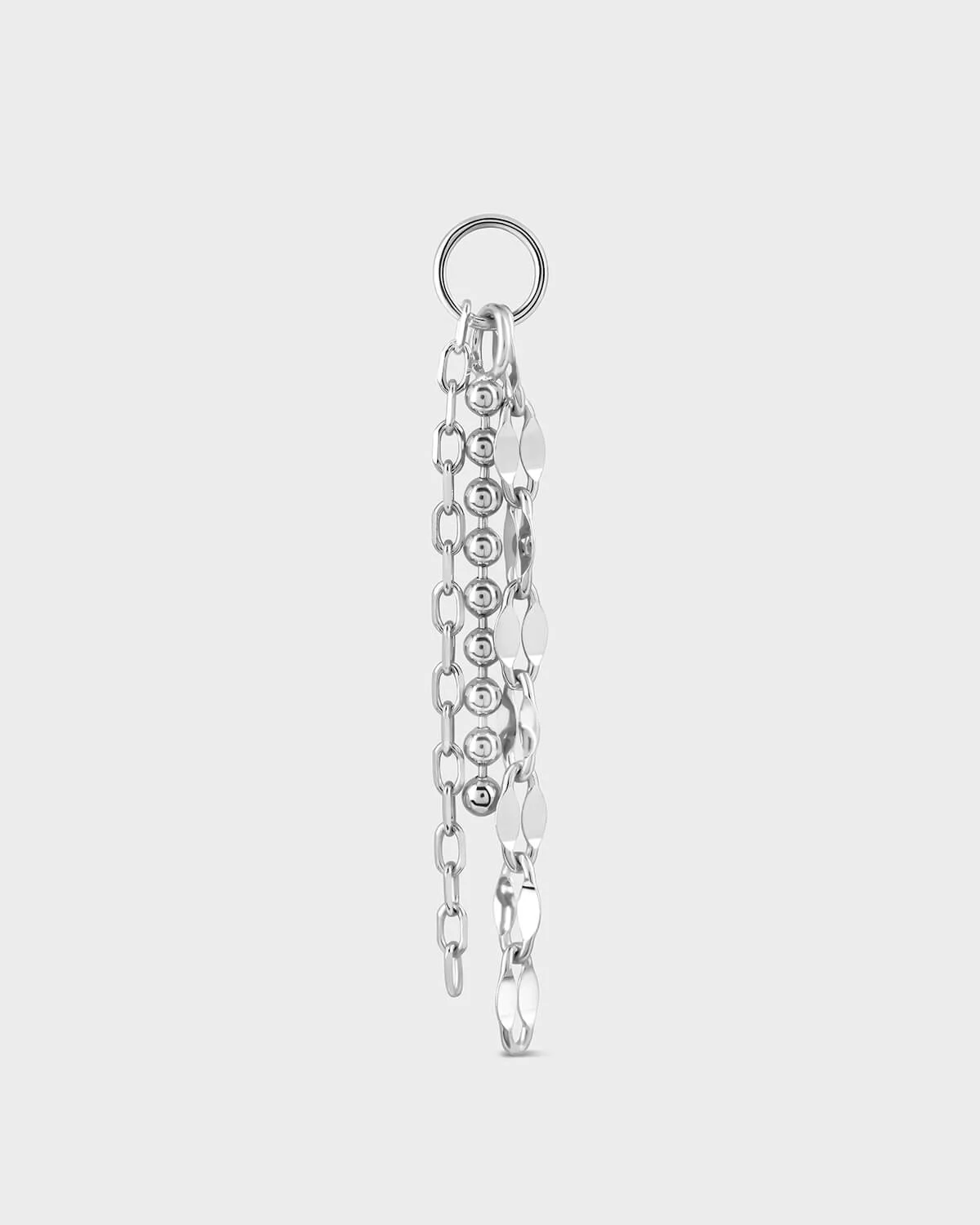 Silver chain earring on a light gray background